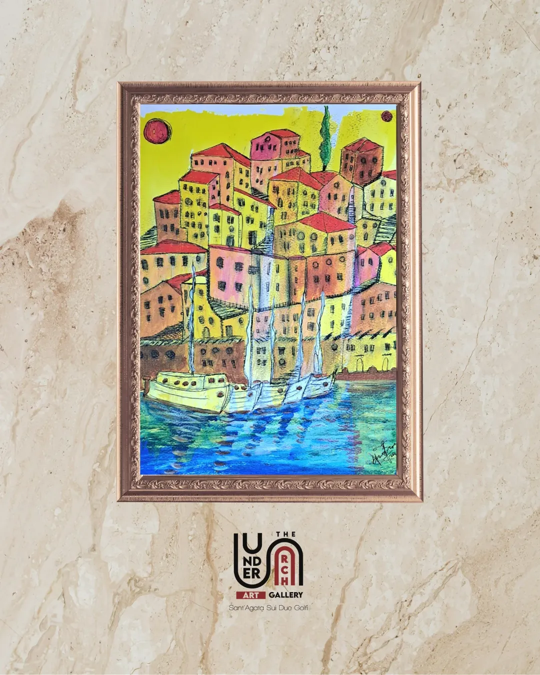 A framed contemporary painting of a colorful seaside village with red-roofed buildings and three sailboats docked in turquoise water.